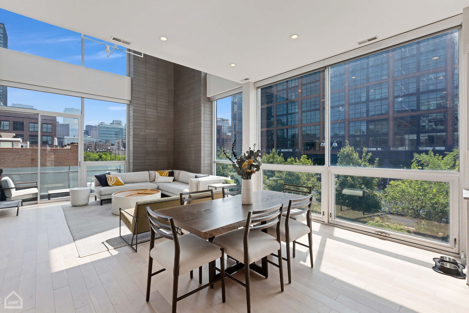 155 North Aberdeen Street, Unit 304 Chicago, IL 60607 - Photo 7 of 33 a view of a dining room with furniture window and outside view