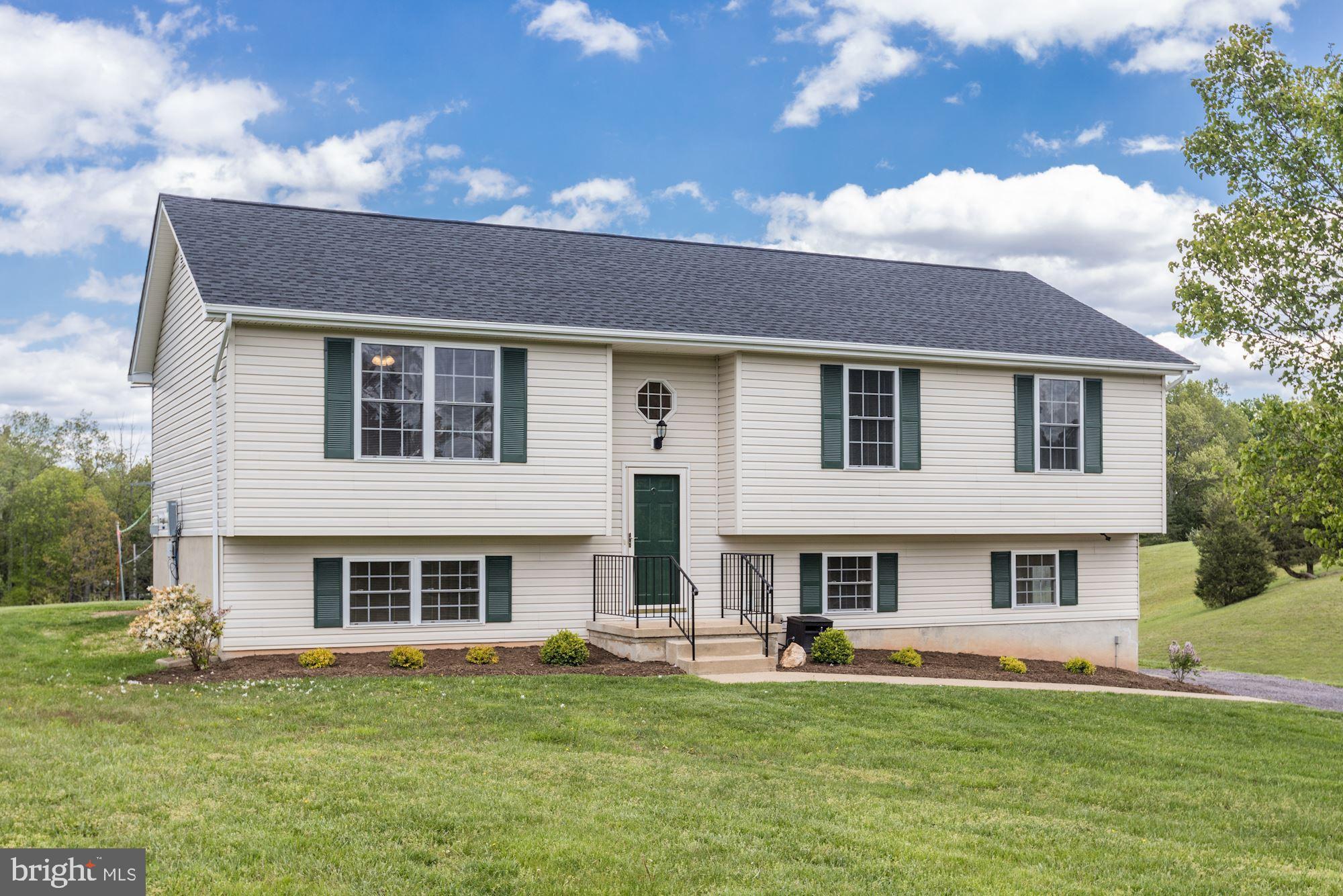 14065 Micah Road Rixeyville, VA 22737 - Photo 1 of 40 a front view of house with yard