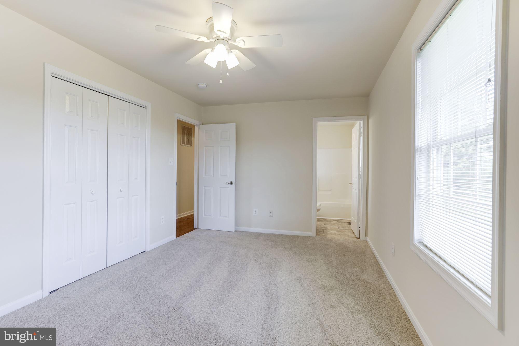 14065 Micah Road Rixeyville, VA 22737 - Photo 18 of 40 a view of an empty room with a window