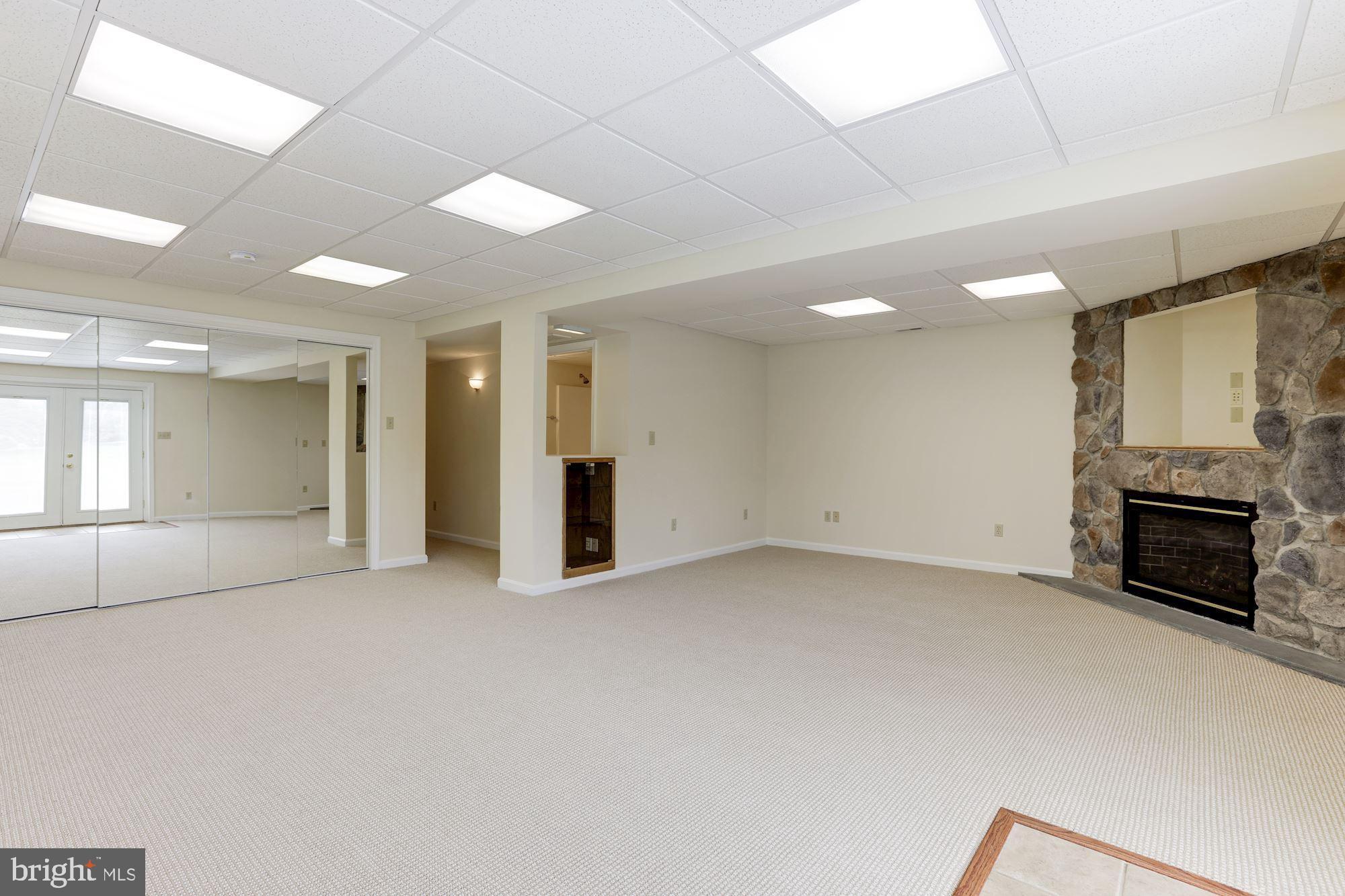 14065 Micah Road Rixeyville, VA 22737 - Photo 26 of 40 a view of an empty room with a fireplace