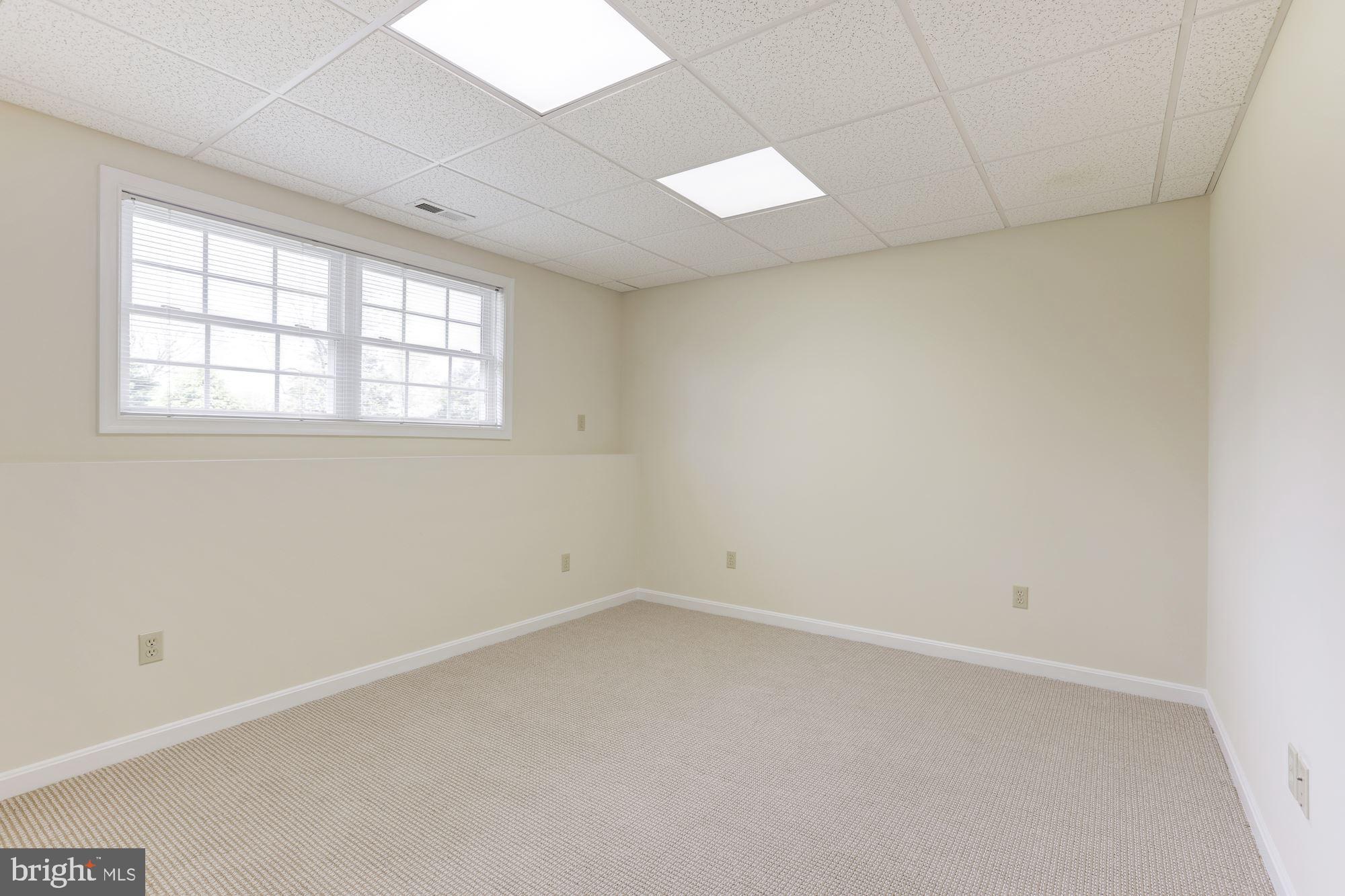 14065 Micah Road Rixeyville, VA 22737 - Photo 29 of 40 an empty room with a window