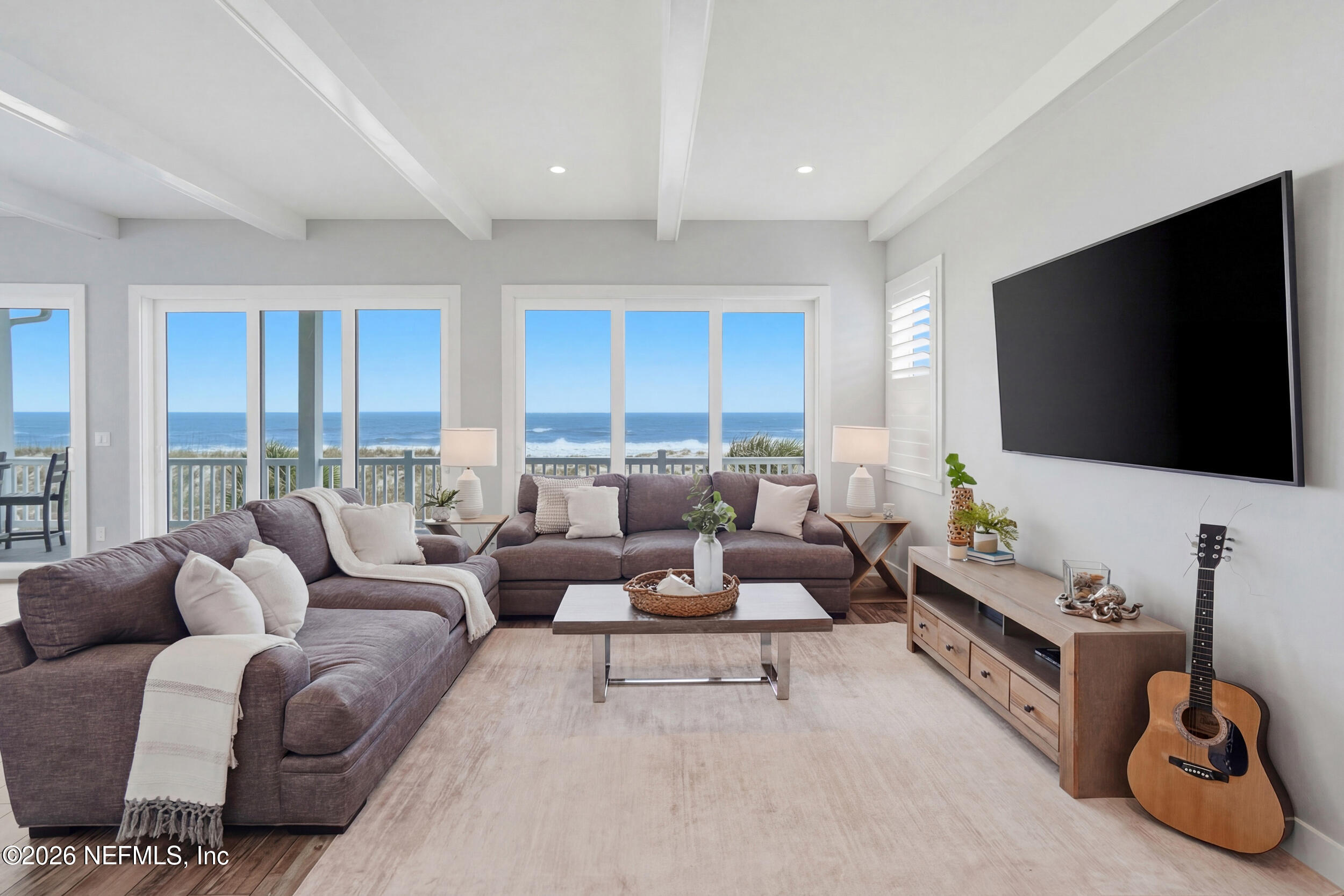 1717 Strand Street Neptune Beach, FL 32266 - Photo 11 of 84 a living room with furniture and a flat screen tv