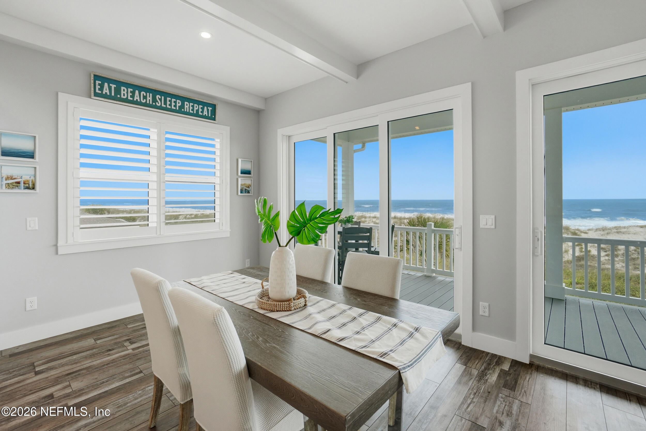 1717 Strand Street Neptune Beach, FL 32266 - Photo 14 of 84 a view of a dining room with furniture and wooden floor
