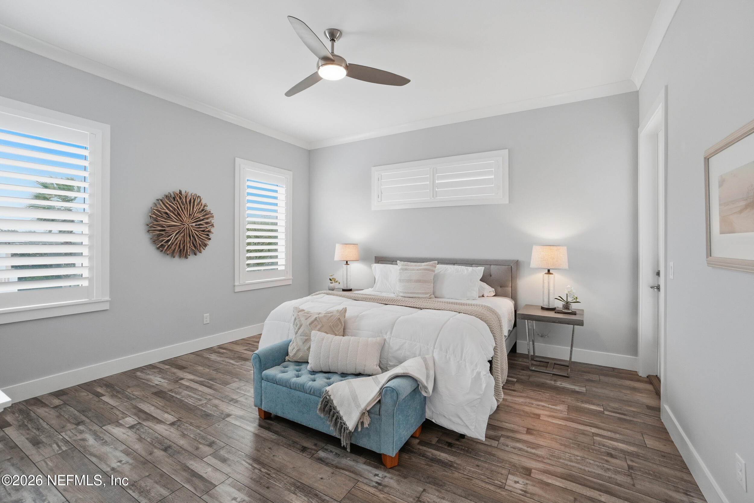 1717 Strand Street Neptune Beach, FL 32266 - Photo 22 of 84 a bedroom with a bed lamp closet and window