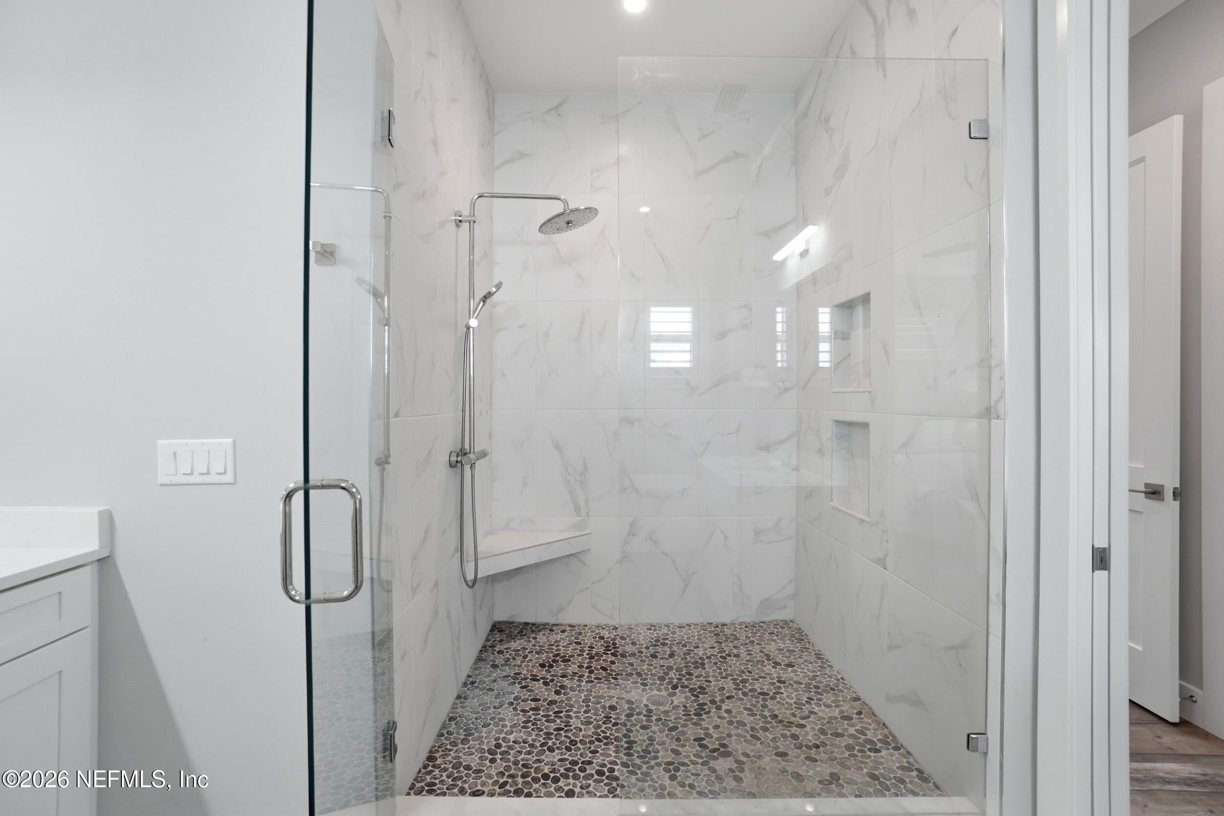 1717 Strand Street Neptune Beach, FL 32266 - Photo 28 of 84 a bathroom with a shower