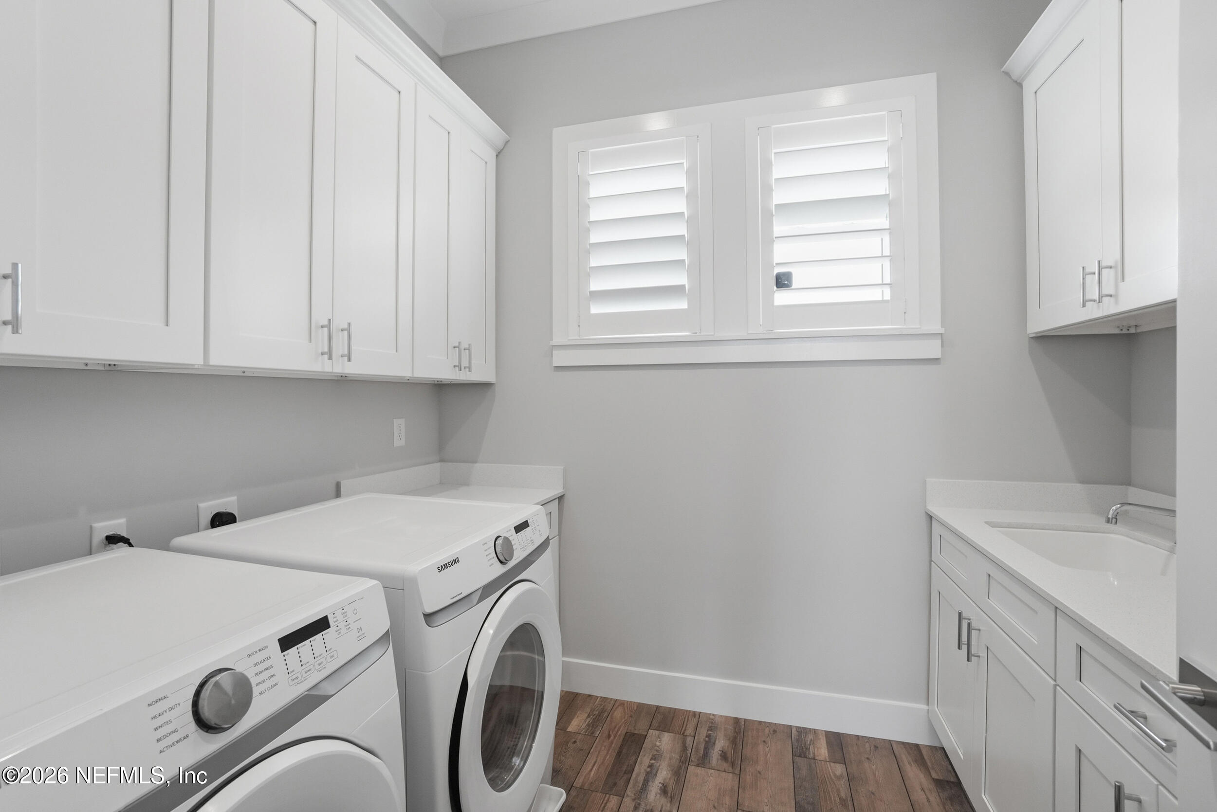 1717 Strand Street Neptune Beach, FL 32266 - Photo 35 of 84 a utility room with dryer and washer