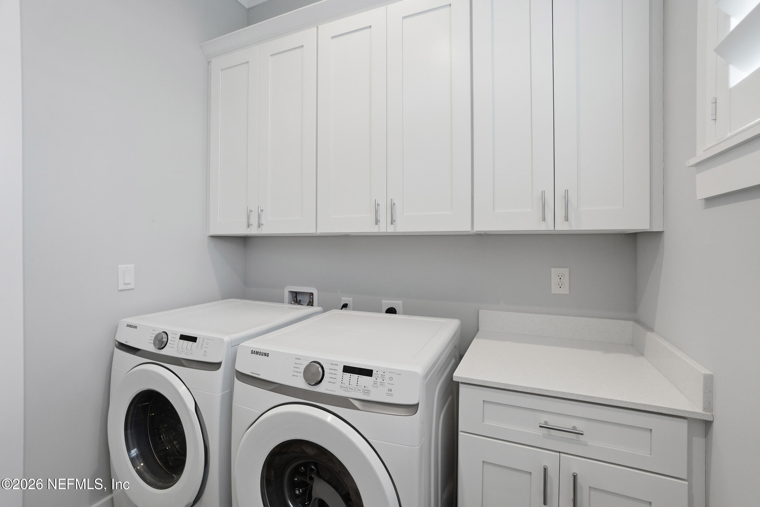 1717 Strand Street Neptune Beach, FL 32266 - Photo 37 of 84 a utility room with dryer and washer