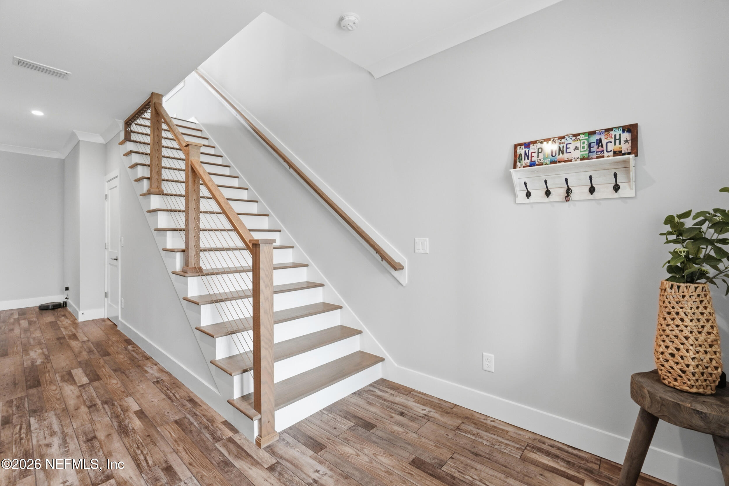 1717 Strand Street Neptune Beach, FL 32266 - Photo 38 of 84 a view of entryway with wooden floor