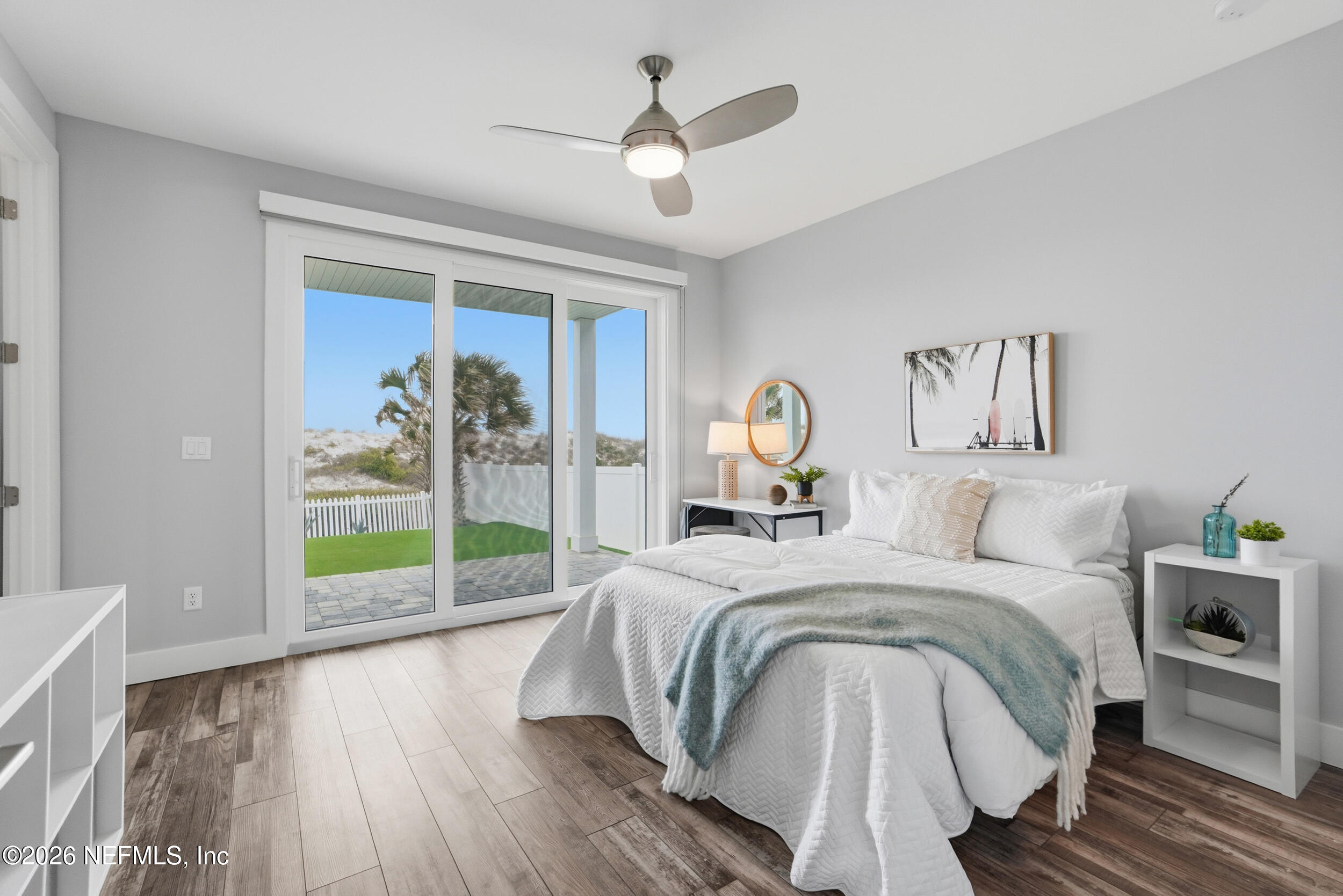 1717 Strand Street Neptune Beach, FL 32266 - Photo 40 of 84 a bed sitting in a spacious bedroom next to a window