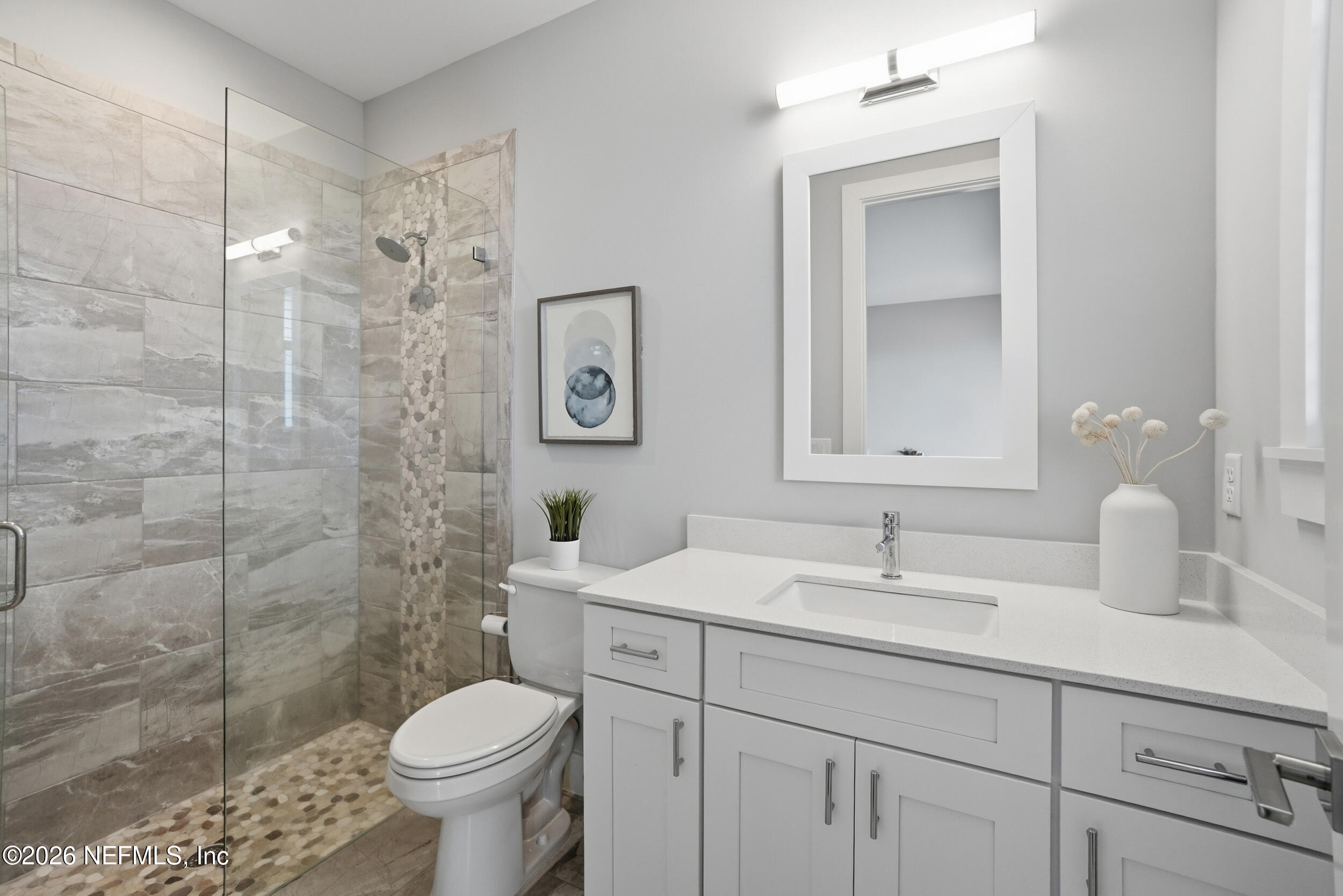 1717 Strand Street Neptune Beach, FL 32266 - Photo 42 of 84 a bathroom with a sink toilet and shower