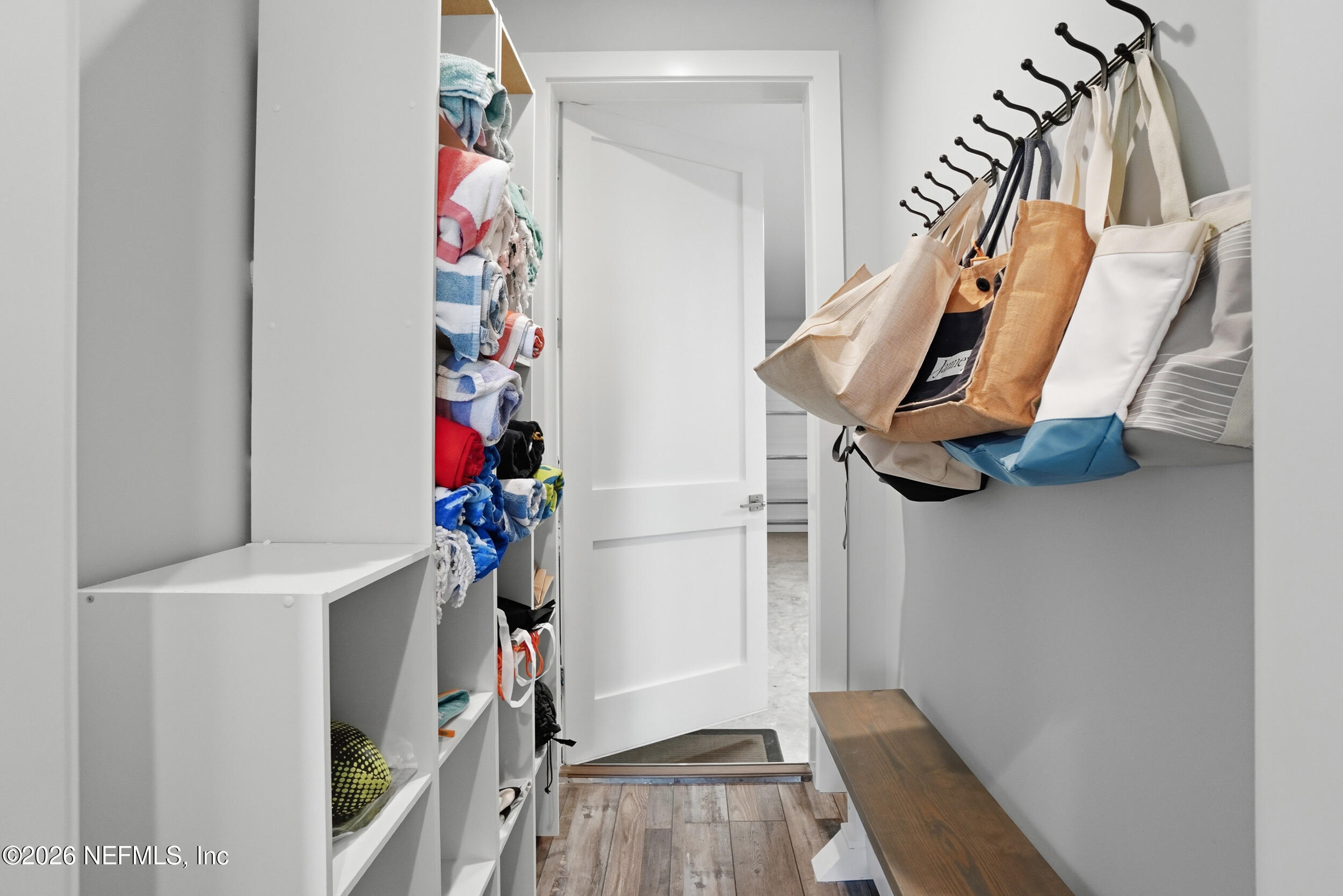 1717 Strand Street Neptune Beach, FL 32266 - Photo 50 of 84 a view of a hallway with wooden floor and stairs