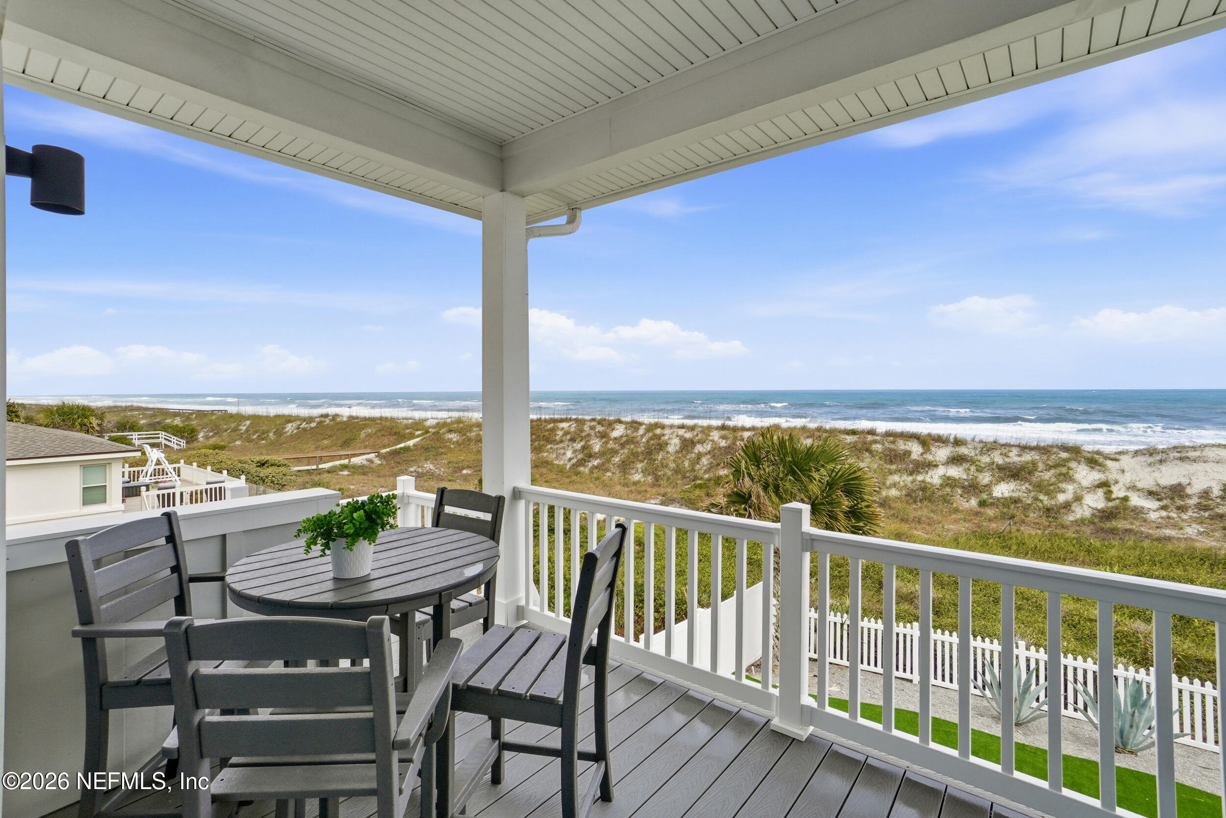 1717 Strand Street Neptune Beach, FL 32266 - Photo 7 of 84 a view of a balcony with an ocean view