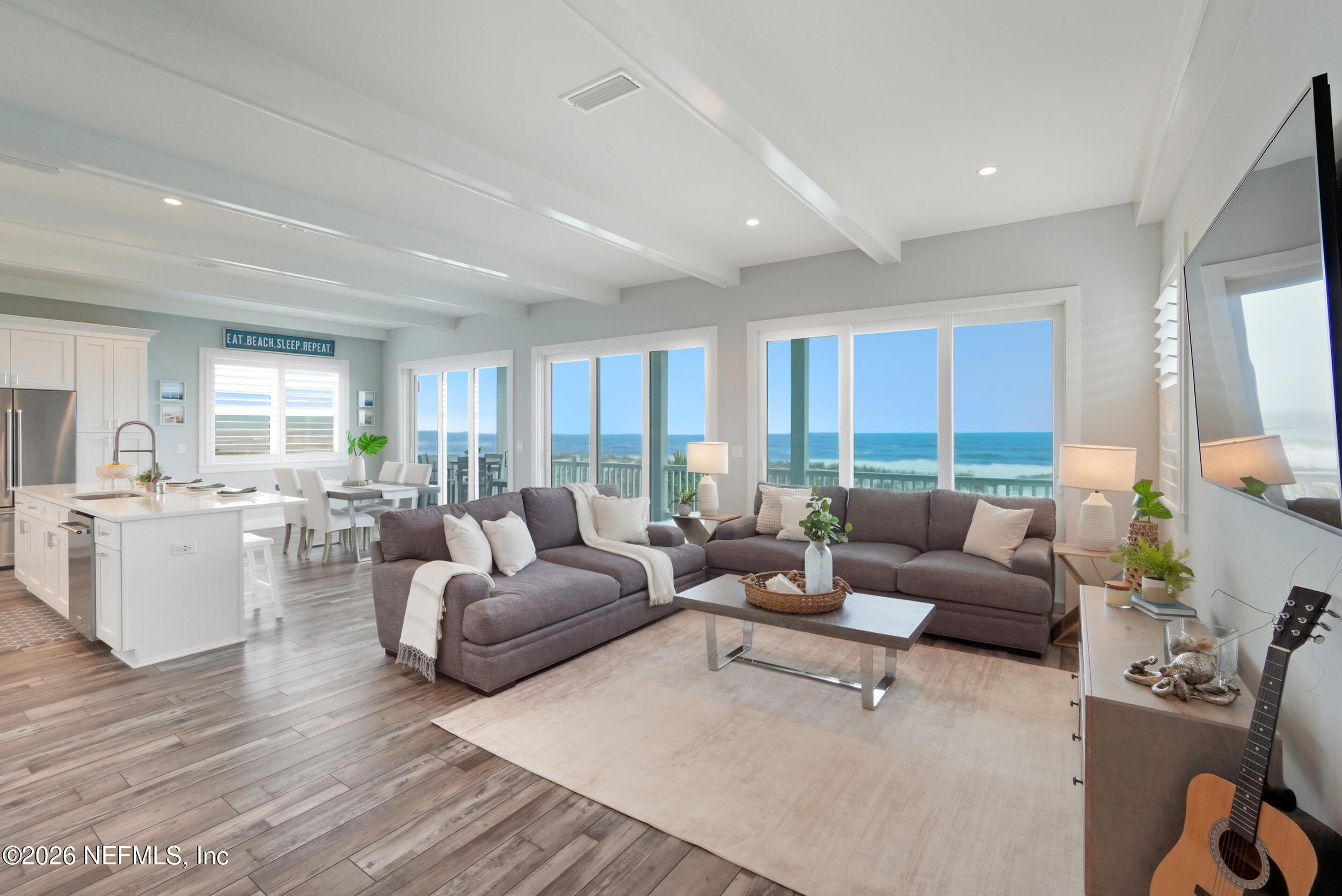 1717 Strand Street Neptune Beach, FL 32266 - Photo 10 of 84 a living room with furniture and a large window