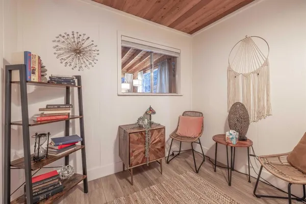 a room with furniture and a window