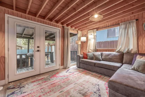 a living room with furniture and a window