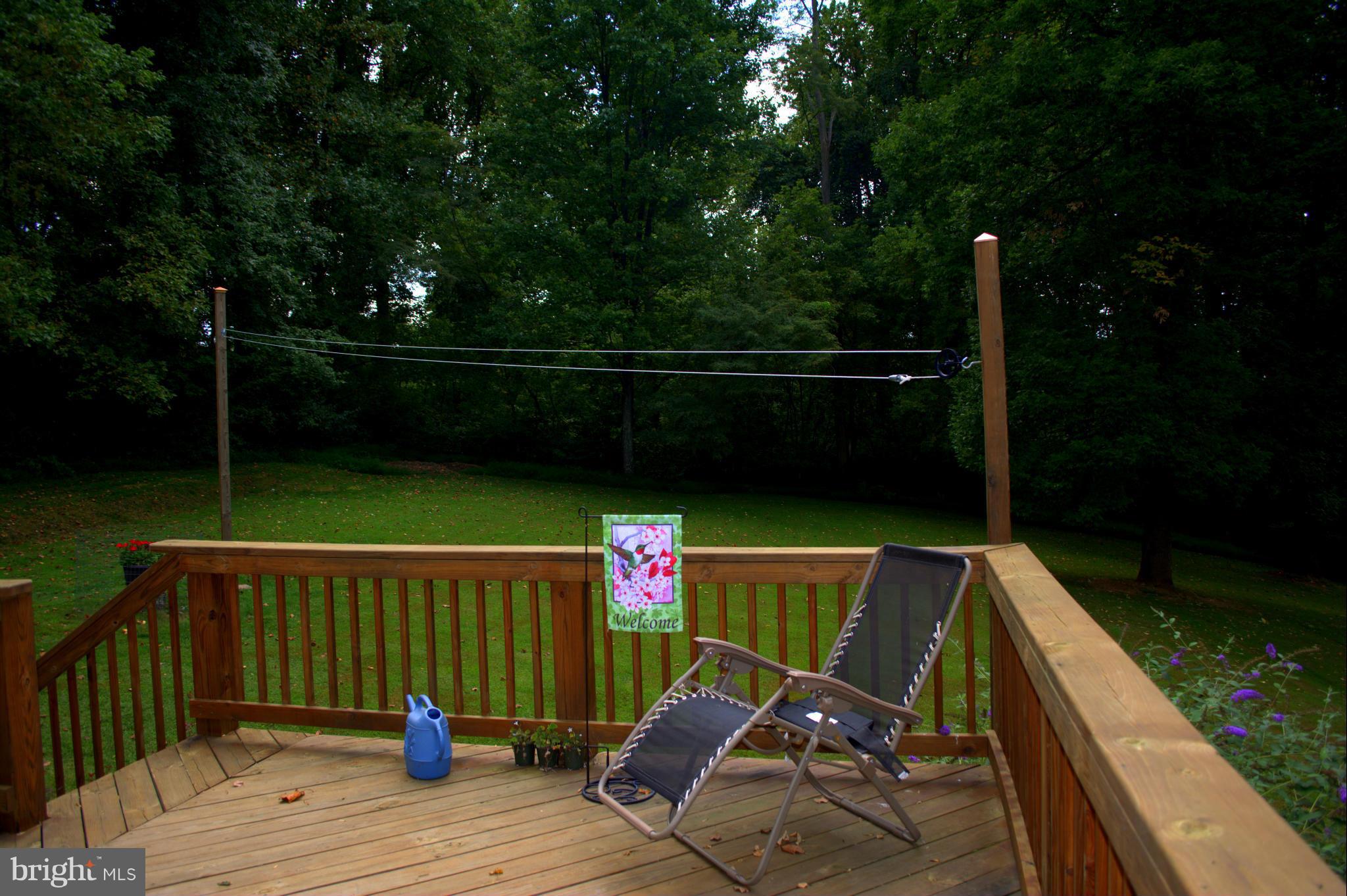 310 High Knob Road Front Royal, VA 22630 - Photo 28 of 30 a view of deck with furniture and garden