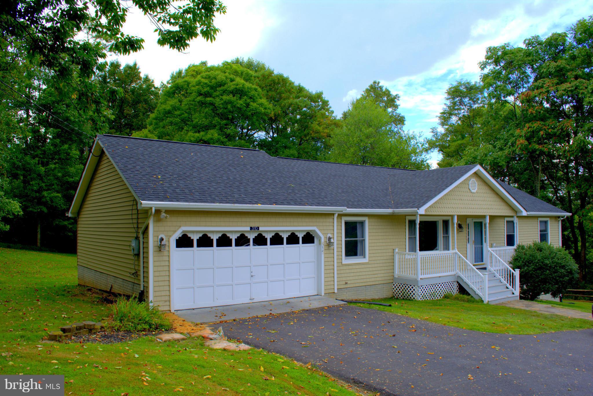 310 High Knob Road Front Royal, VA 22630 - Photo 30 of 30 a view of a house with garden and yard