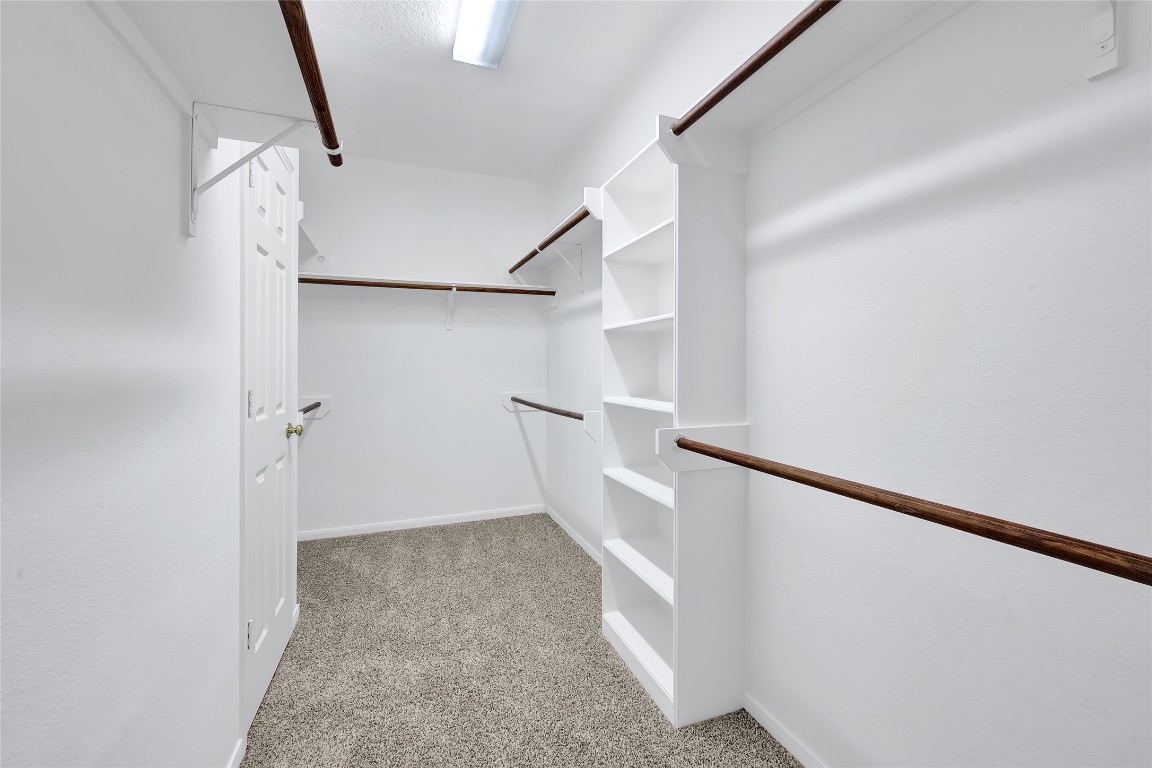 9606 Summer Run Houston, TX 77064 - Photo 21 of 41 Oversized walk-in closet with ample storage and organized layout.