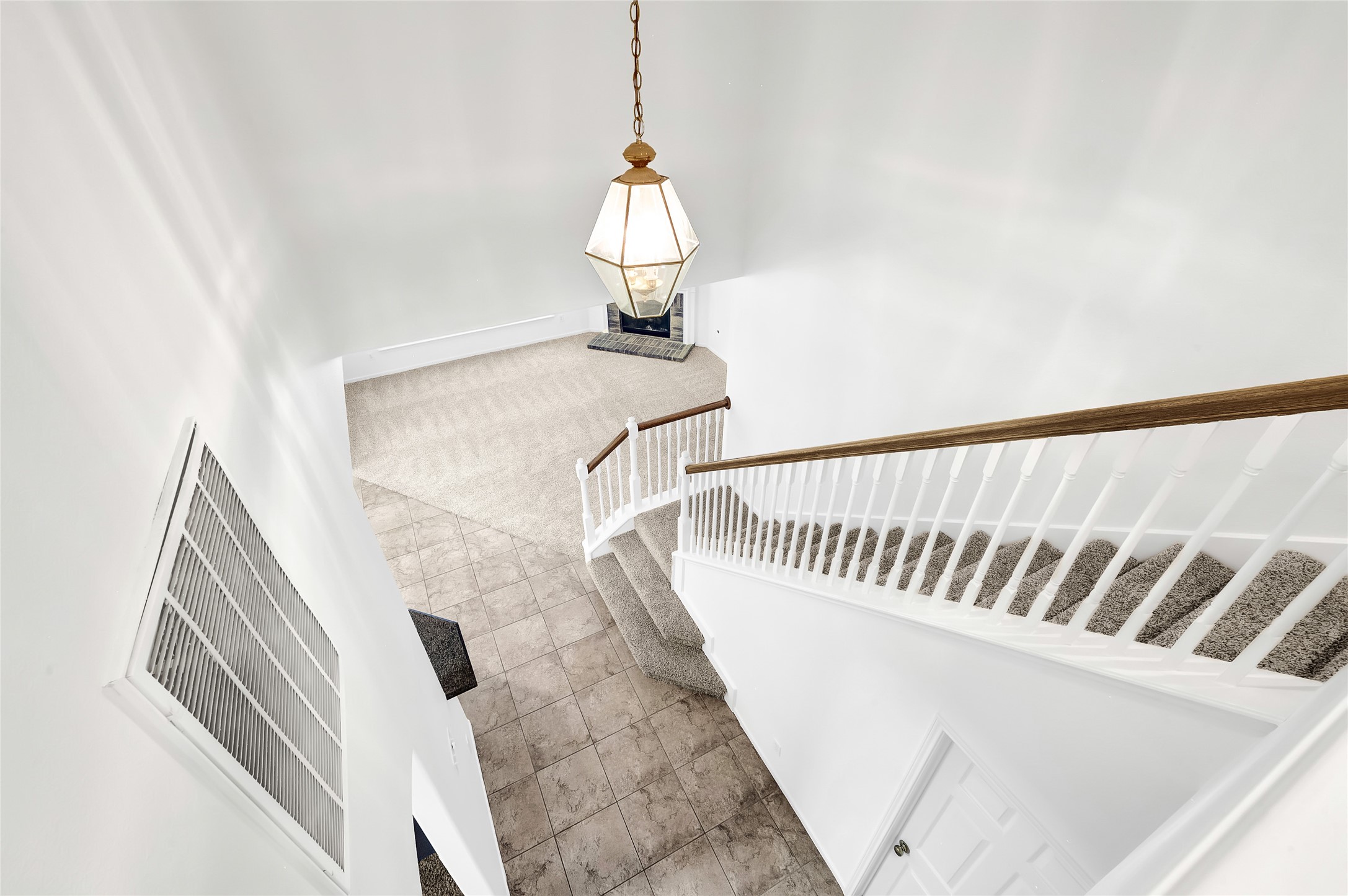 9606 Summer Run Houston, TX 77064 - Photo 26 of 41 Open hallway with an overlook to living and entry enhancing space, light, and architectural flow