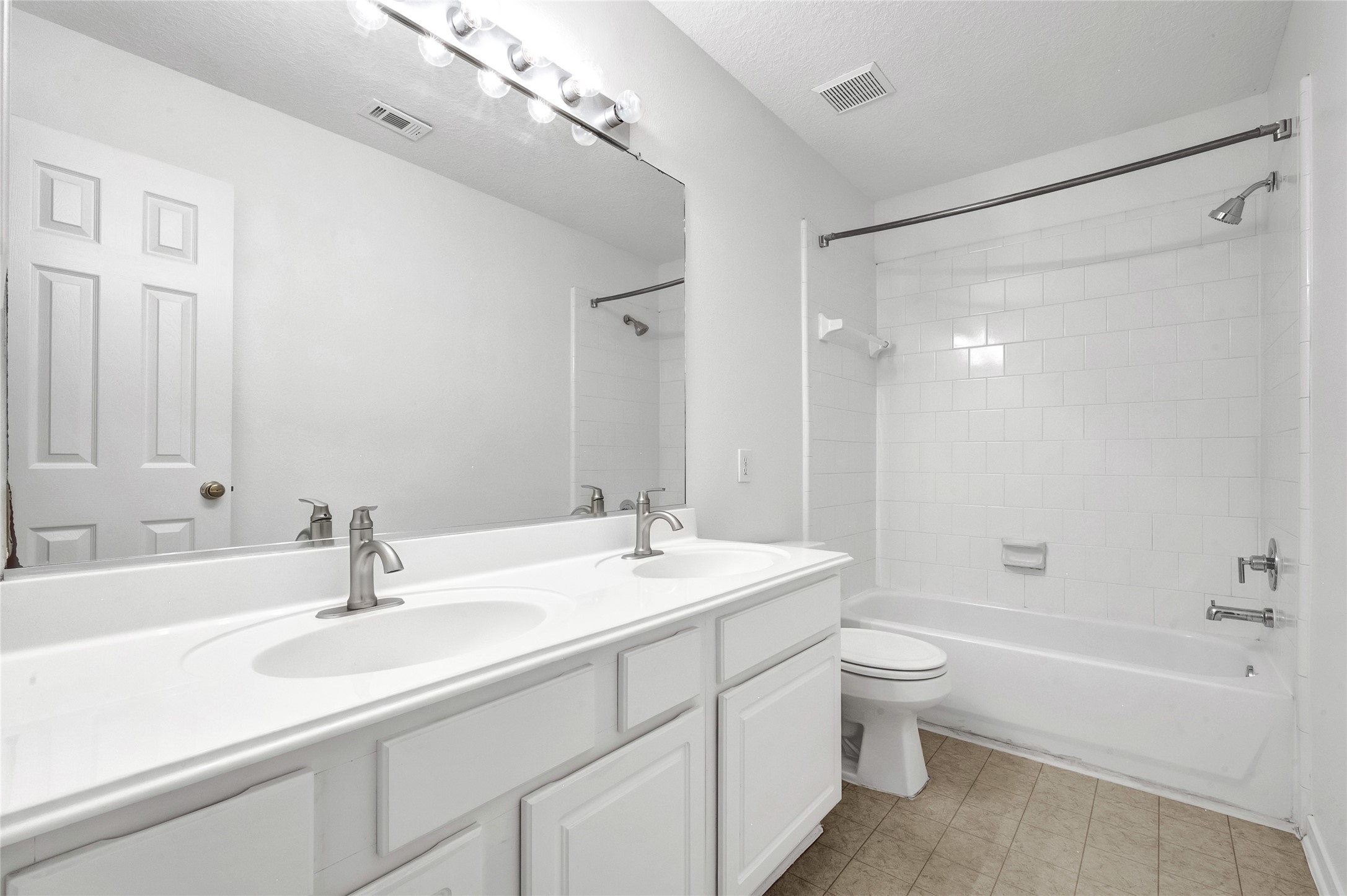 9606 Summer Run Houston, TX 77064 - Photo 30 of 41 Functional full bathroom with dual sinks and tub/shower combo perfect for busy mornings and guest use.