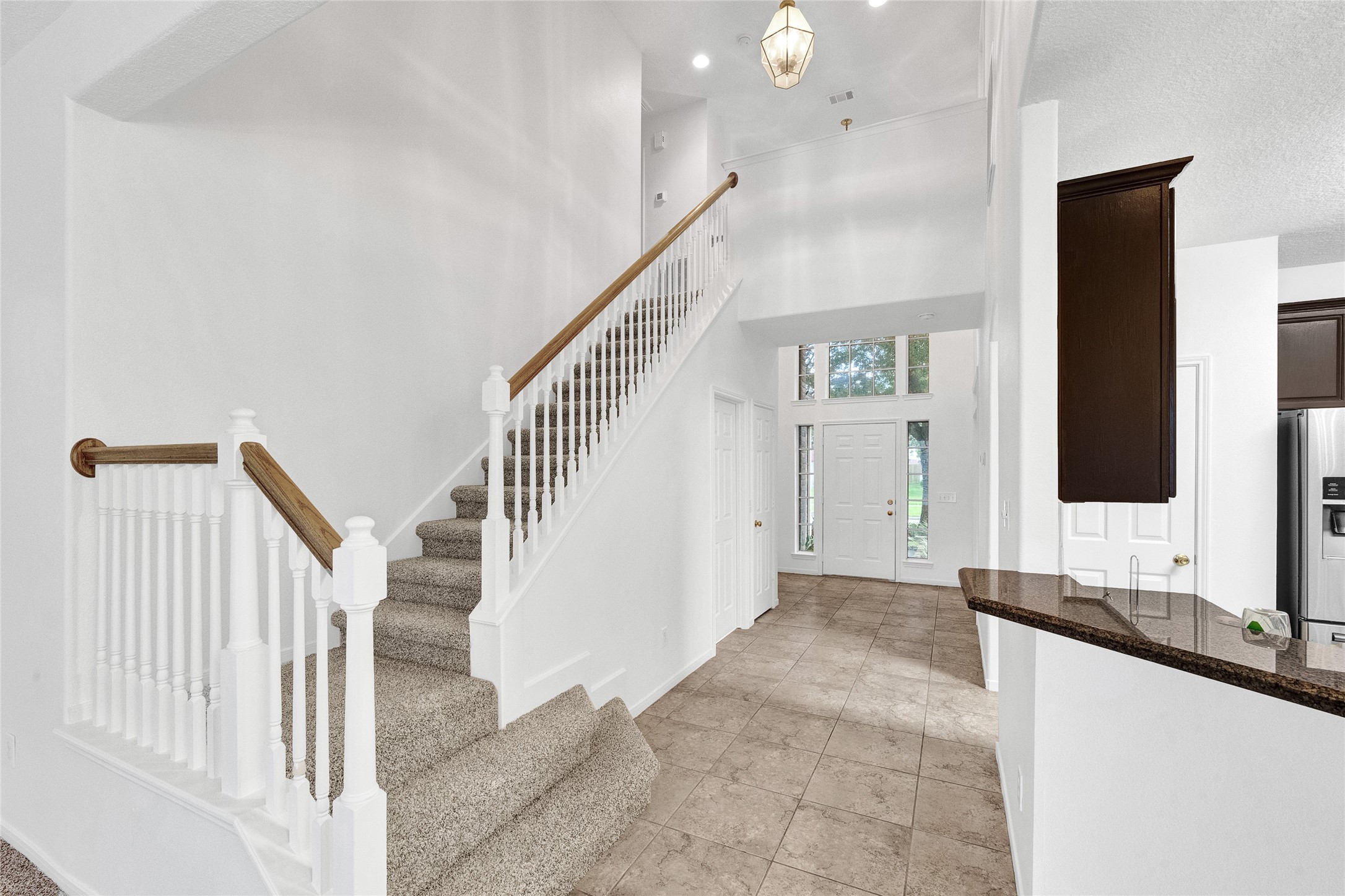 9606 Summer Run Houston, TX 77064 - Photo 4 of 41 Grand entry with soaring ceilings, abundant natural light, and an inviting first impression.