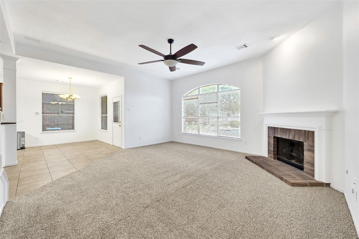 9606 Summer Run Houston, TX 77064 - Photo 6 of 41 Open concept living area with 10’ ceilings and seamless flow to kitchen, breakfast, and entry.