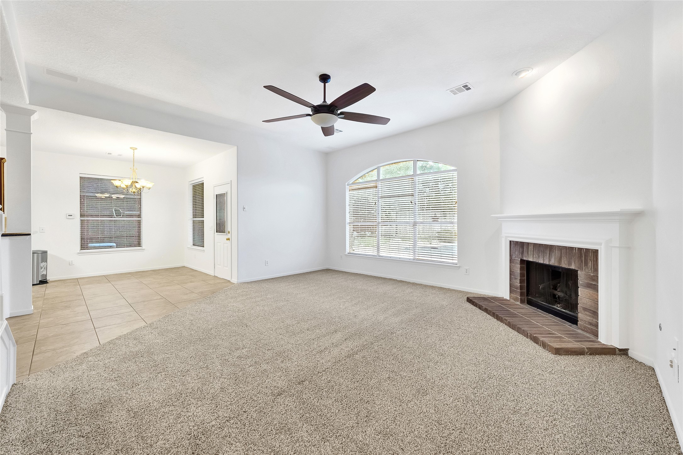 9606 Summer Run Houston, TX 77064 - Photo 8 of 41 Open concept living area with 10’ ceilings and seamless flow to kitchen, breakfast, and entry.