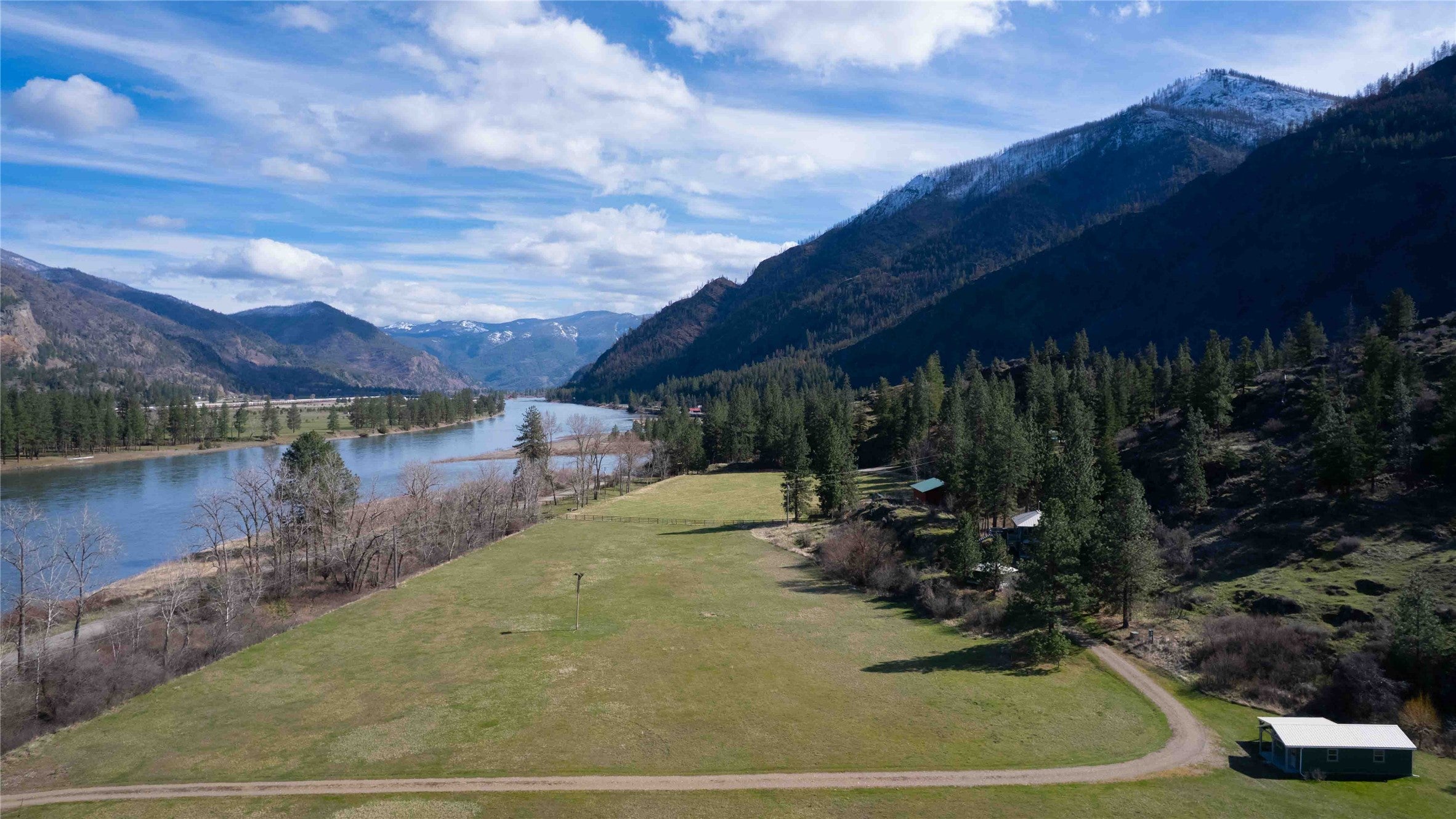 440 River Road East Plains, MT 59859 - Photo 1 of 1 Country home with Clark Fork River Frontage, mountain views and pasture land (Property line is at the fence).