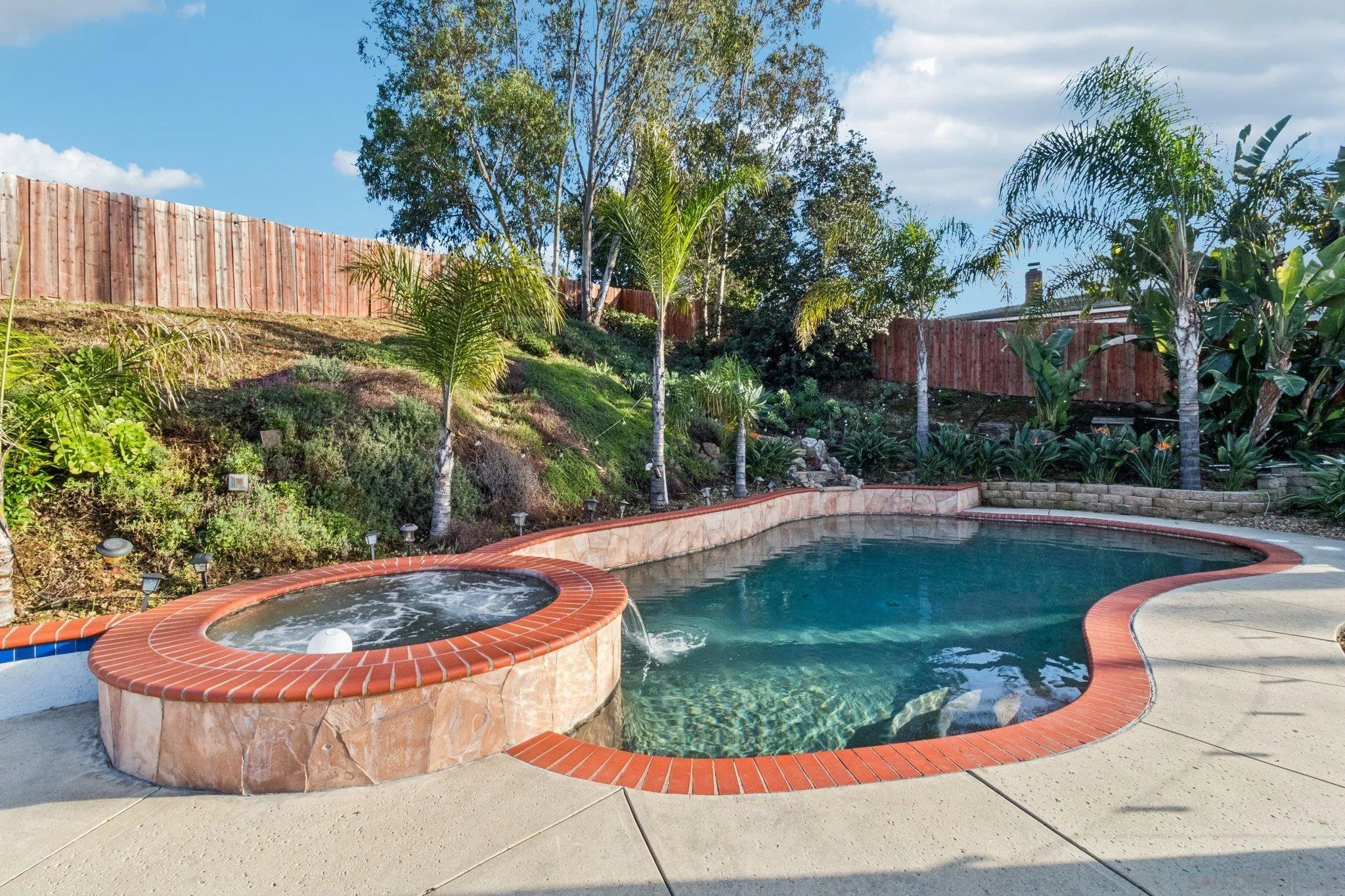3365 South Bonita Street Spring Valley, CA 91977 - Photo 4 of 32 a view of a swimming pool with a yard