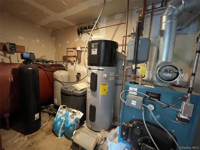 a room with furniture and a flat screen tv