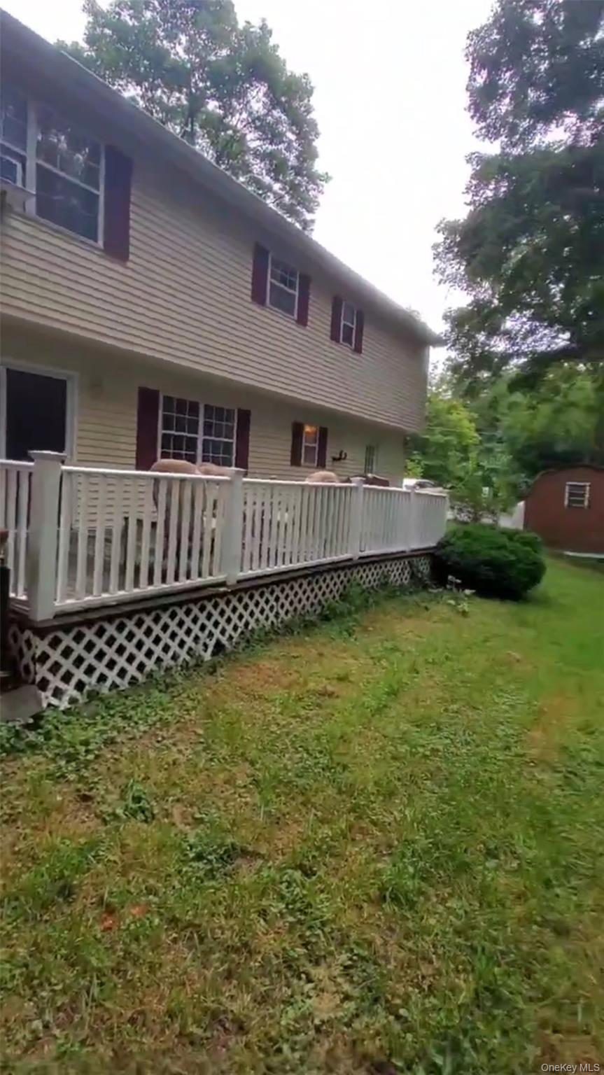 257 Lake Road Salisbury Mills, NY 12577 - Photo 20 of 30 a front view of a house with garden