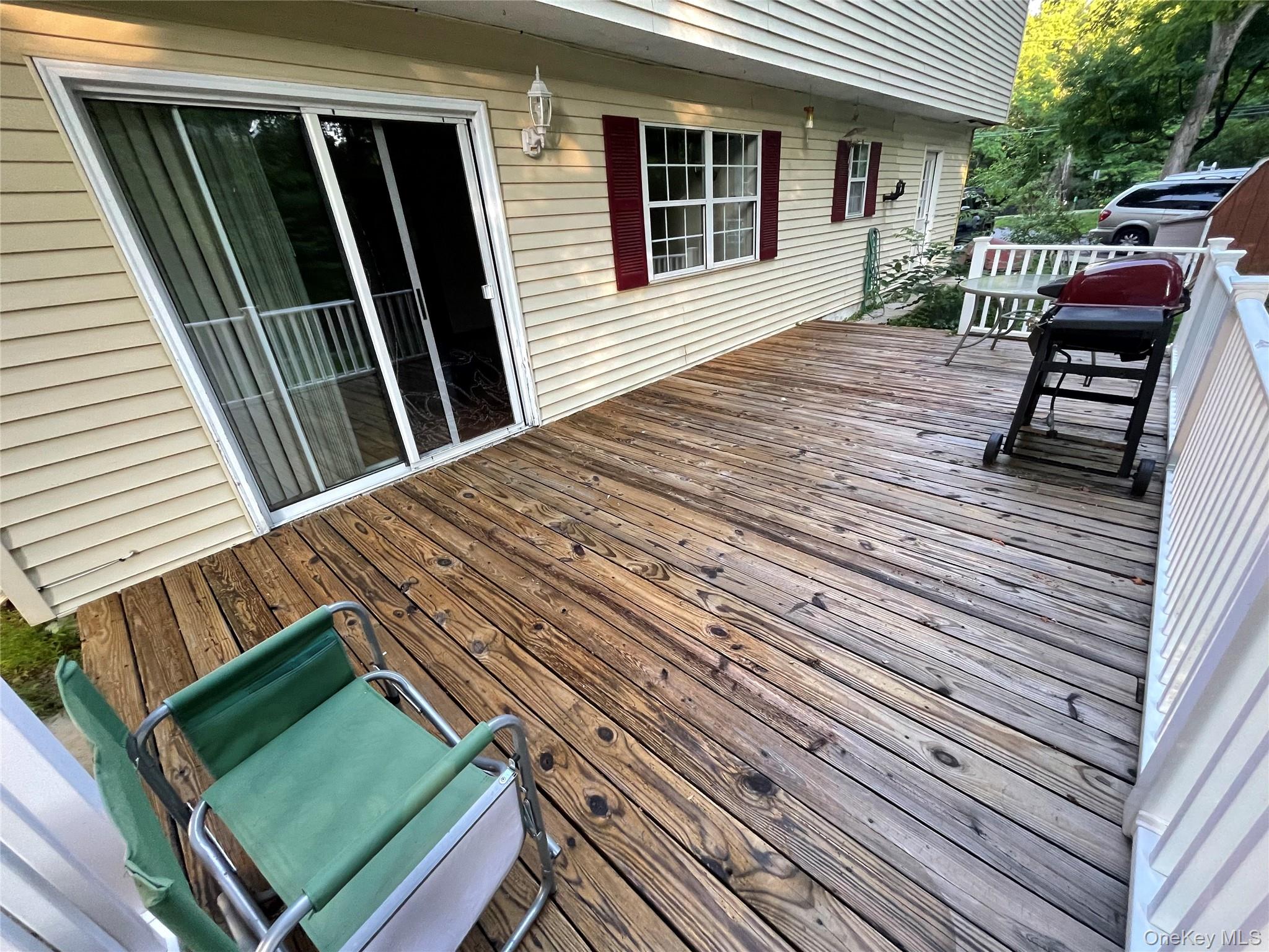 257 Lake Road Salisbury Mills, NY 12577 - Photo 25 of 30 a backyard of a house with seating space