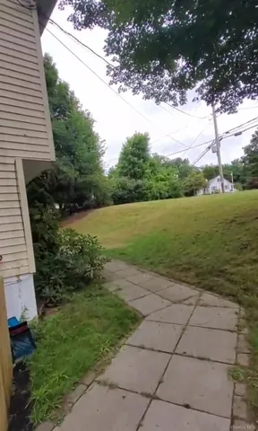 a view of a lake with a yard