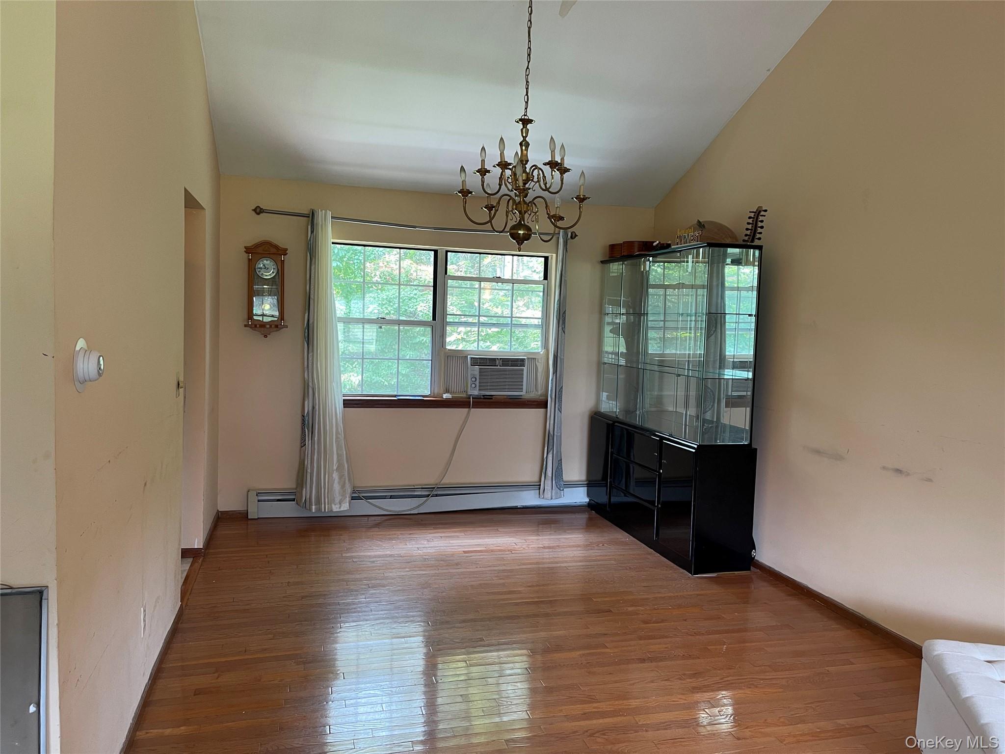 257 Lake Road Salisbury Mills, NY 12577 - Photo 5 of 30 a view of a room with wooden floor front door and windows