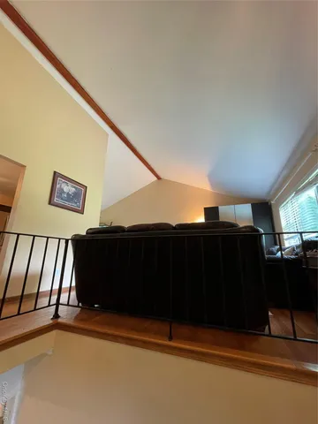 a view of balcony with furniture