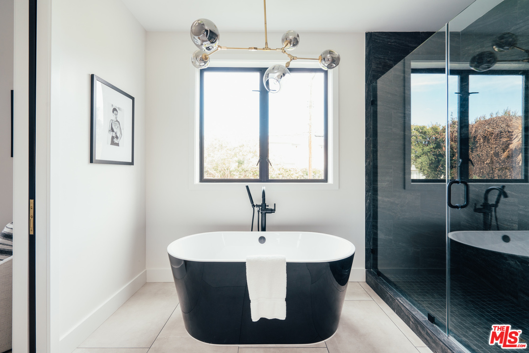 3207 Earlmar Drive Los Angeles, CA 90064 - Photo 36 of 51 a white sink sitting next to a window