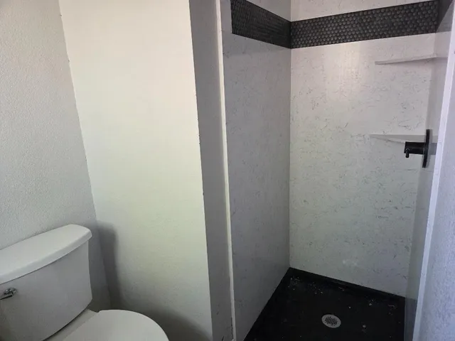 a bathroom with a toilet