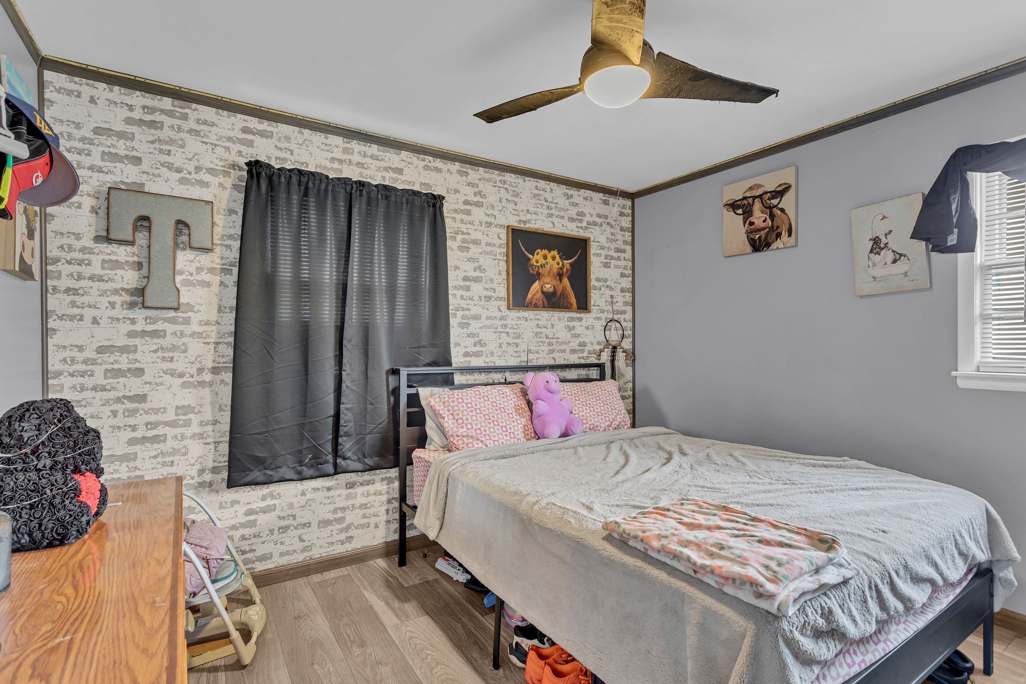 60 Main Street Ethridge, TN 38456 - Photo 13 of 25 a bedroom with a bed and a couch