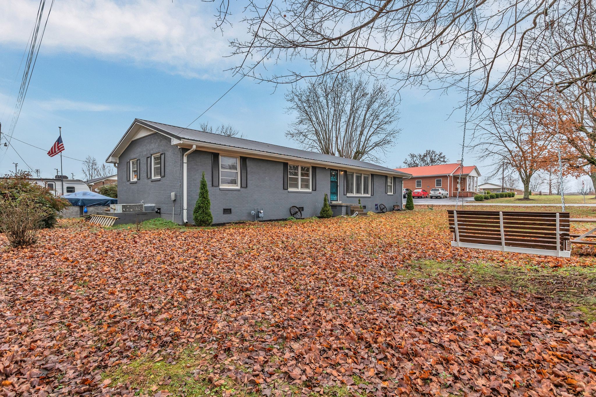 60 Main Street Ethridge, TN 38456 - Photo 2 of 25 a front view of a house with a yard
