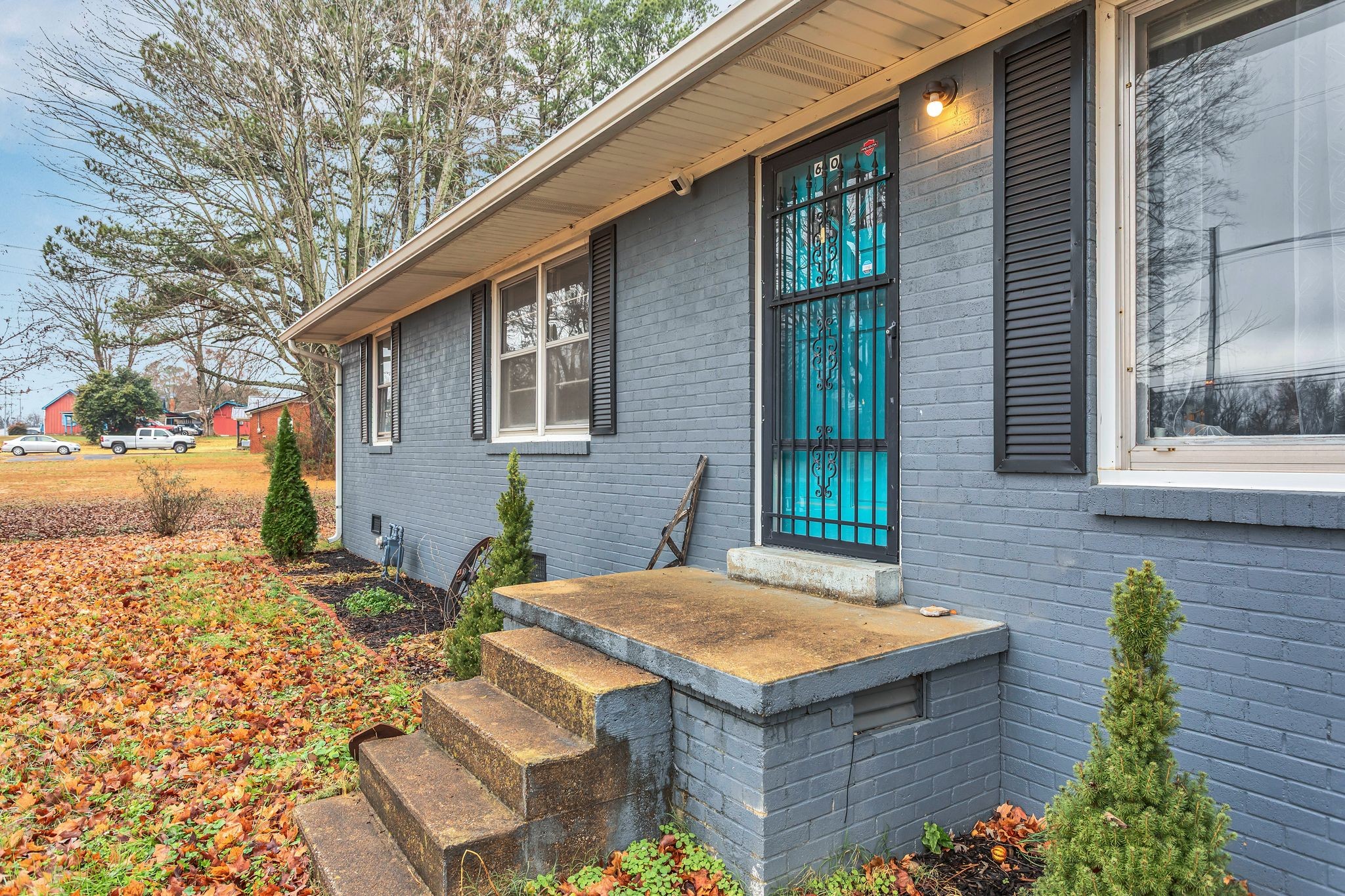 60 Main Street Ethridge, TN 38456 - Photo 5 of 25 a view of house with backyard and sitting area