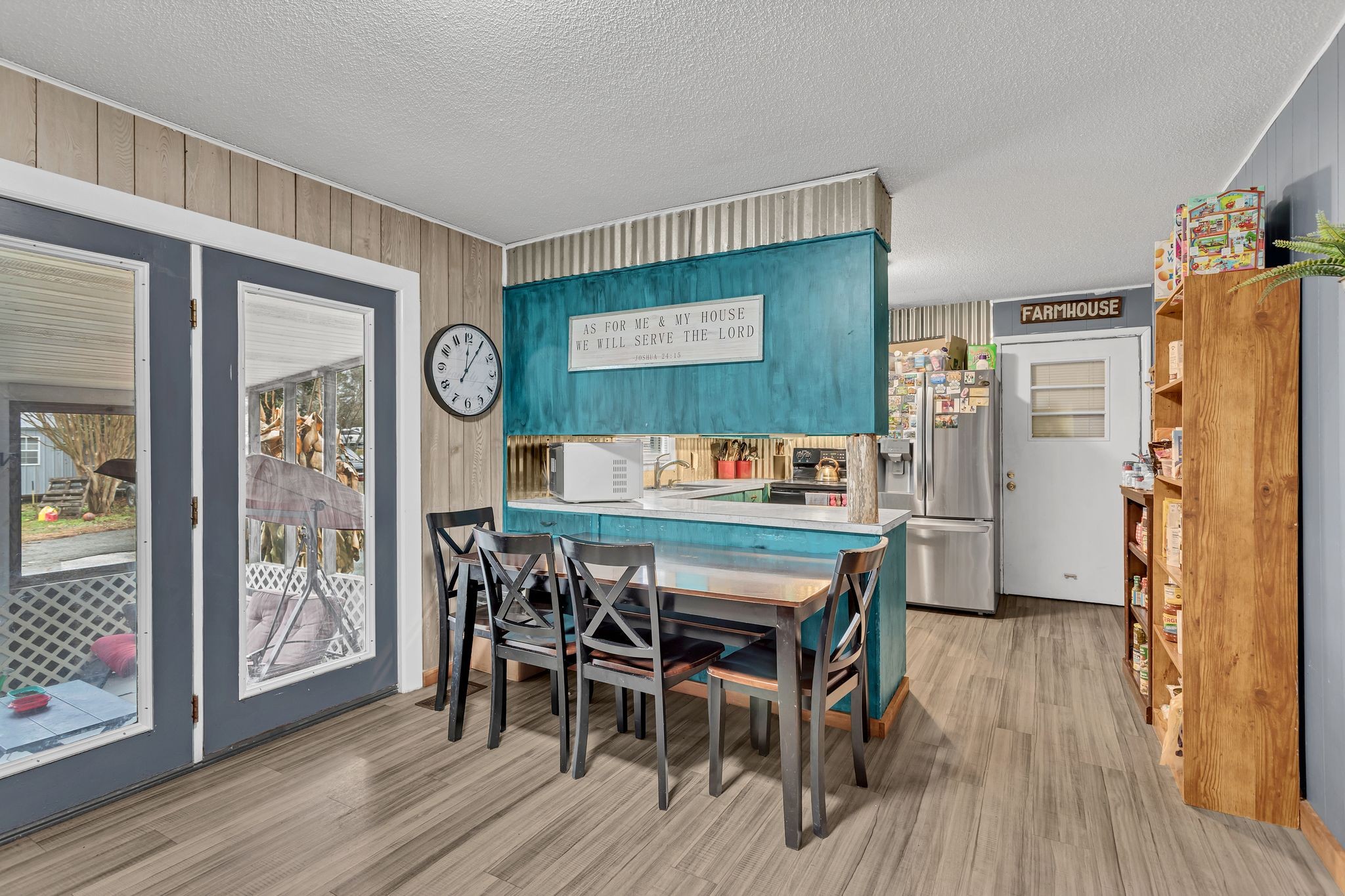 60 Main Street Ethridge, TN 38456 - Photo 9 of 25 a view of a dining room with furniture window and wooden floor
