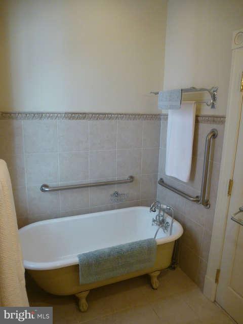 618 4th Street Northeast Washington, DC 20002 - Photo 13 of 30 a bathroom with a bathtub and shower