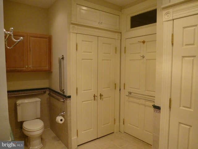 618 4th Street Northeast Washington, DC 20002 - Photo 20 of 30 a bathroom with a shower and a toilet