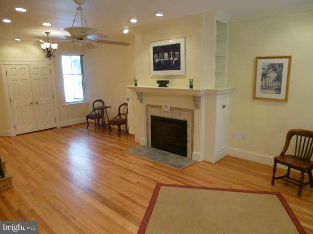 618 4th Street Northeast Washington, DC 20002 - Photo 4 of 30 a living room with furniture and a fireplace