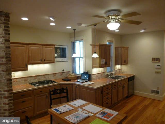618 4th Street Northeast Washington, DC 20002 - Photo 9 of 30 a kitchen with a stove and a sink