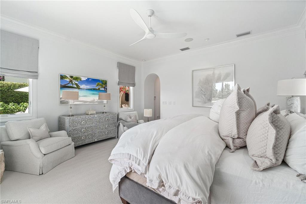 16755 Lucarno Way Naples, FL 34110 - Photo 13 of 50 a bedroom with two beds and a couch