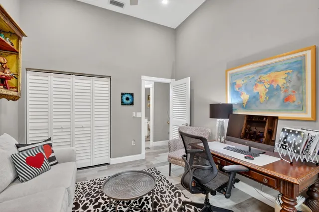 a view of a house with backyard porch and garden