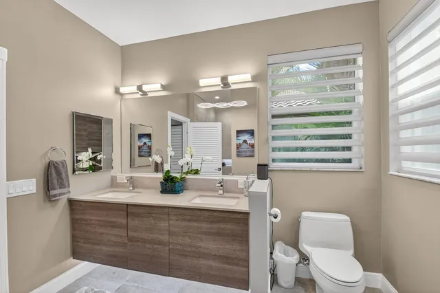 a view of a multi story building with a yard