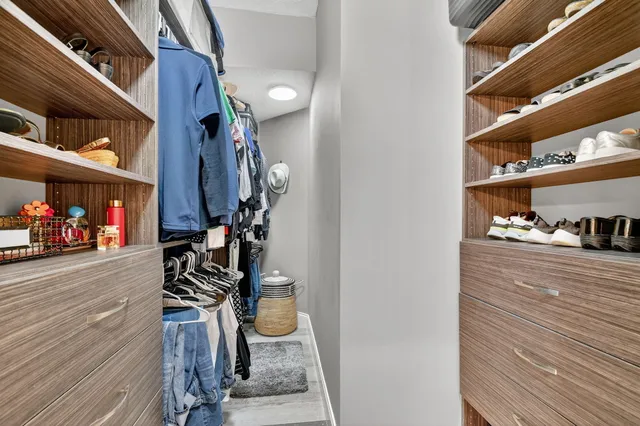 a front view of a house with a yard table and chairs