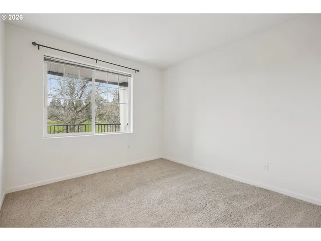 a bathroom with a toilet sink and shower
